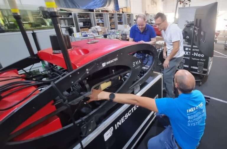 A New Way to Explore Flooded Mines Using Muon Imaging and Underwater Robots